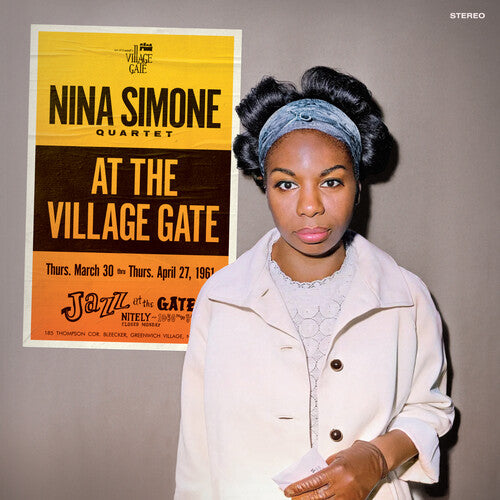 AT THE VILLAGE GATE